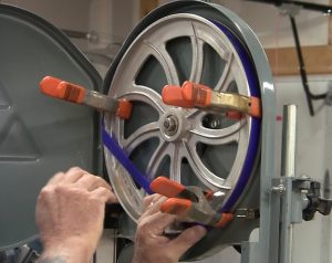 Replacing the tires during your 30-Minute Bandsaw Rehab is easy and doesn't have to get you wet.